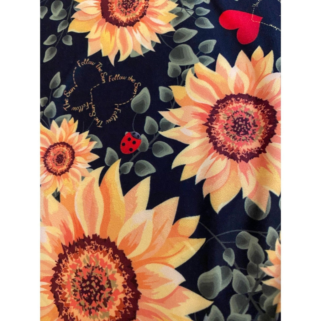 Sunflower Leggings with Black Lace Shorts.